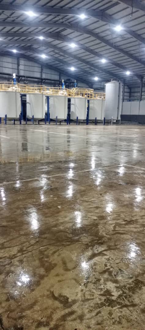 Decorative epoxy floor installation in a modern home